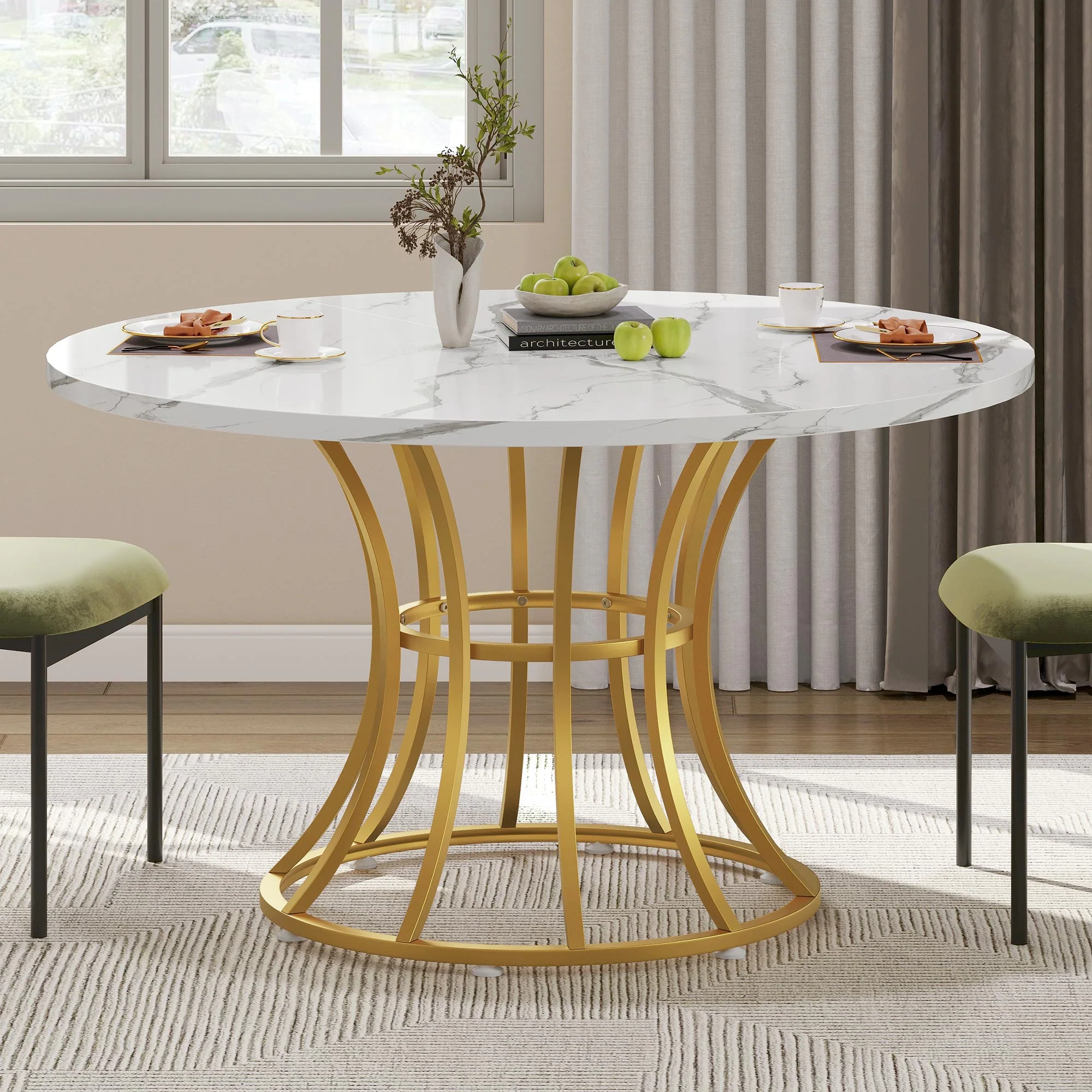 elegant contemporary dining space with marble table and gold base, surrounded by chairs, and decorated with fruit and vase