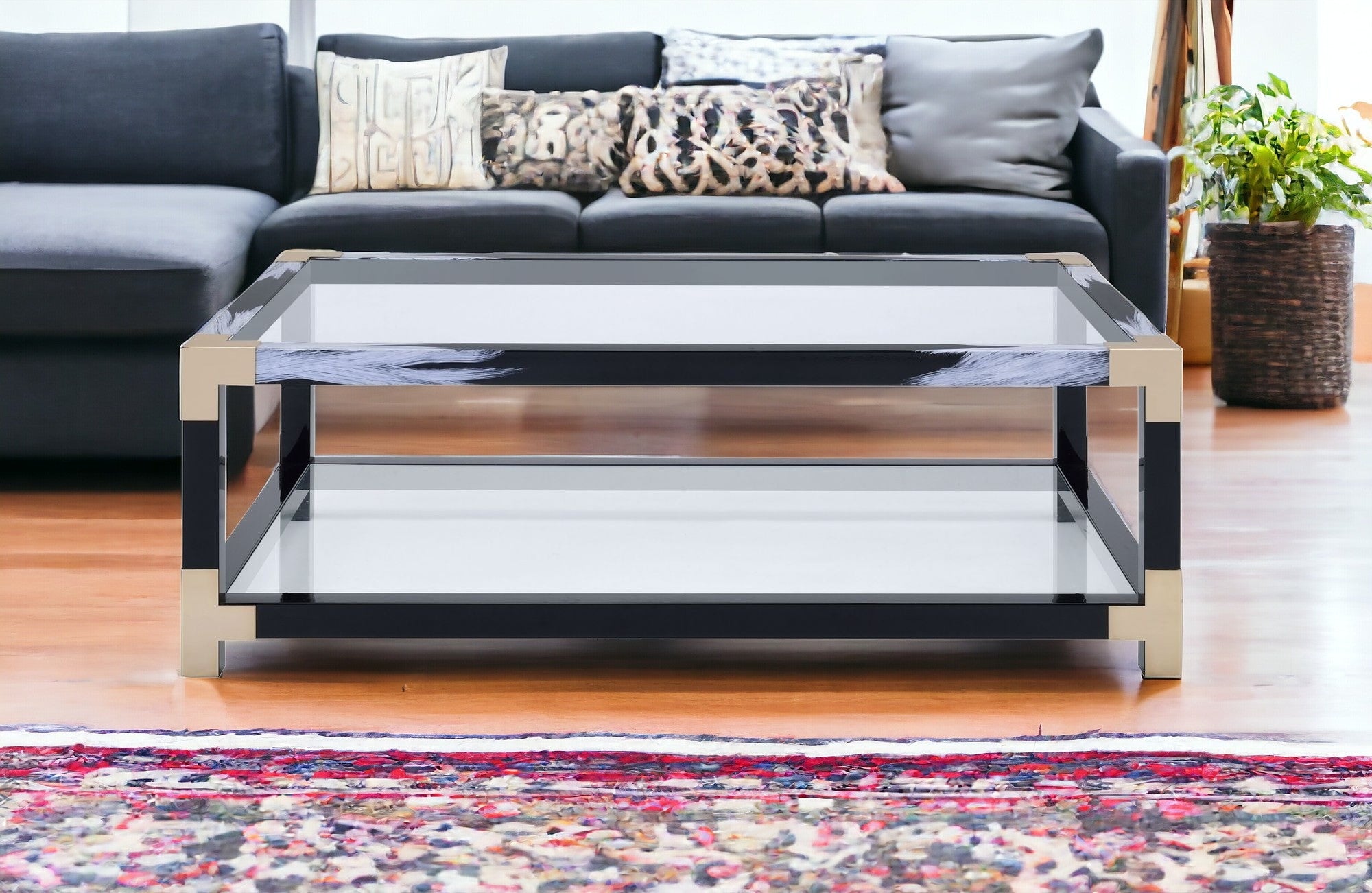 54" Clear And Black and White Glass And Metal Coffee Table With Shelf