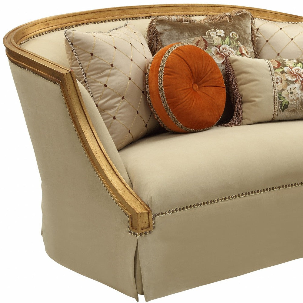 41" Tan And Gold Polyester Blend Curved Love Seat and Toss Pillows