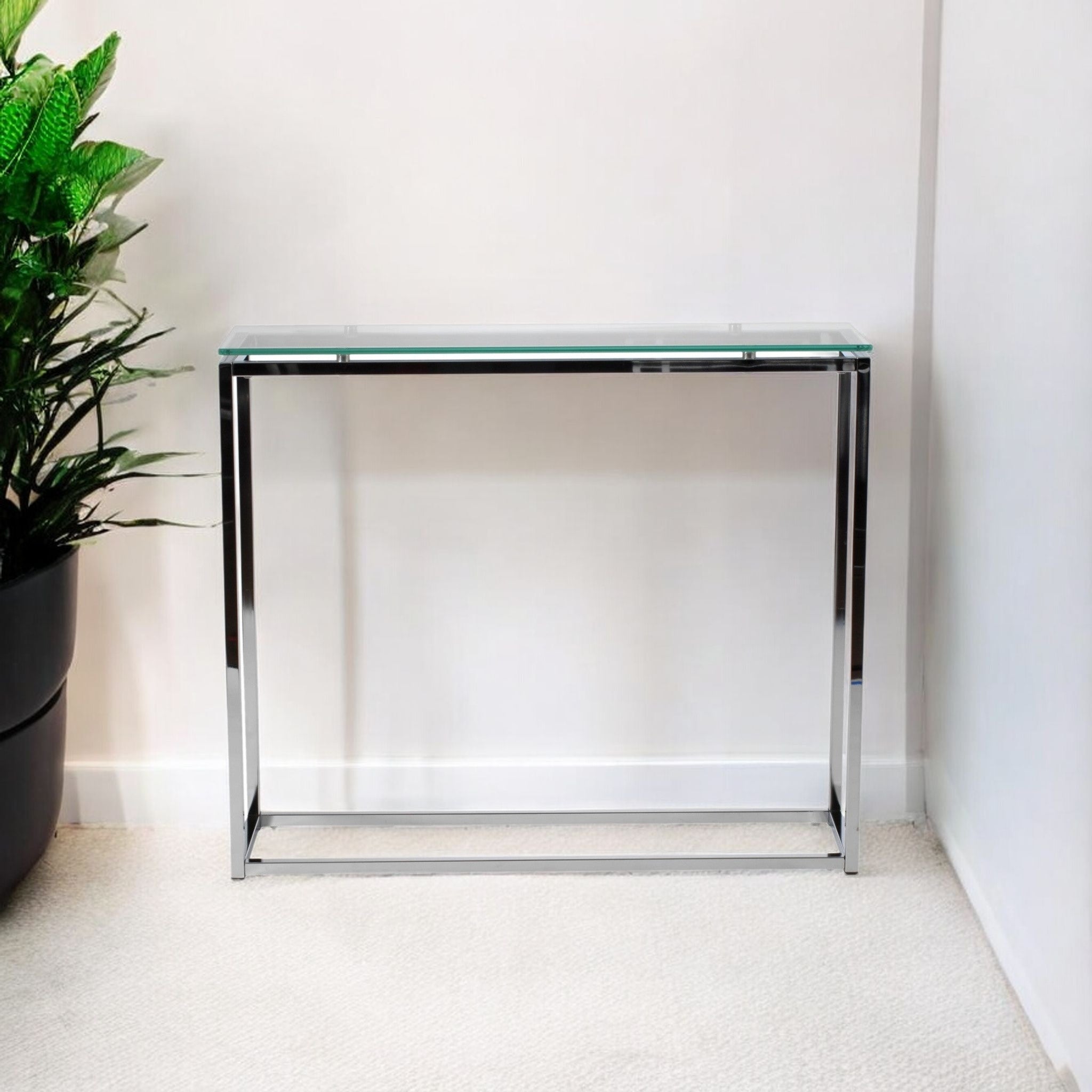 36" Clear and Silver Glass Sled Console Table