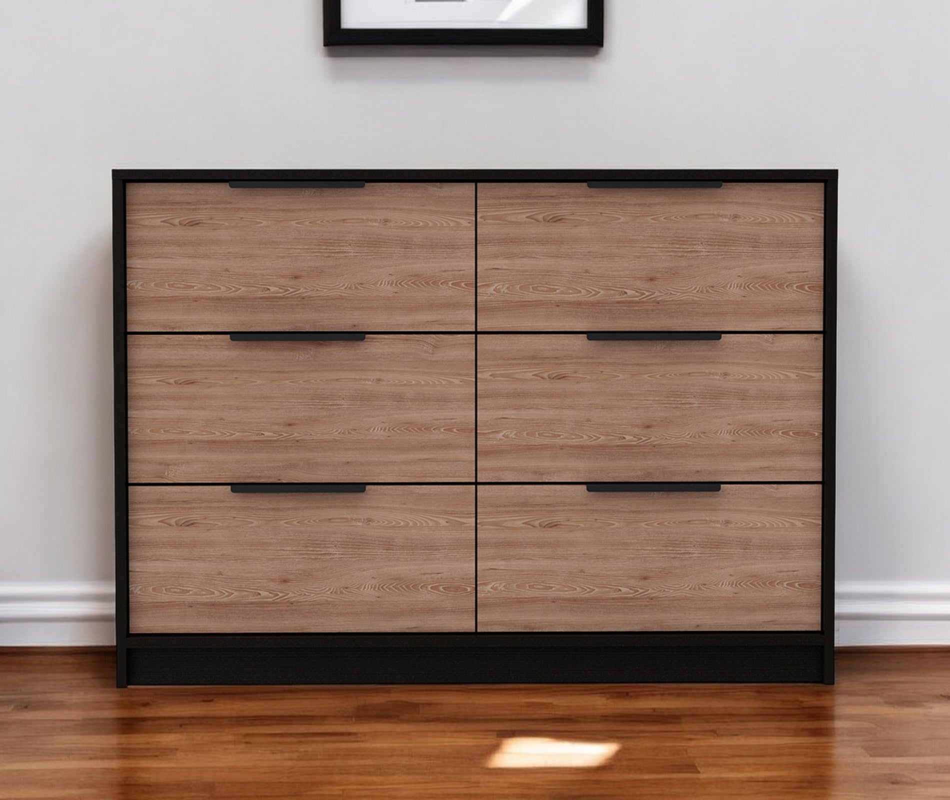 42" Brown and Black Four Drawer Dresser