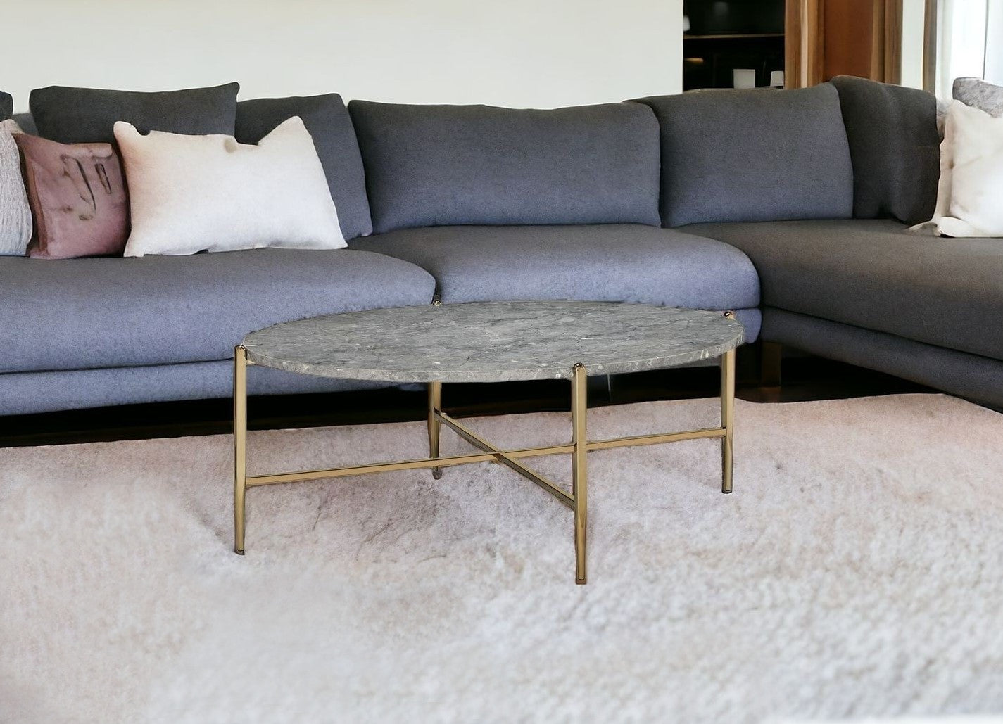 48" Gray And Champagne Faux Marble And Metal Oval Coffee Table