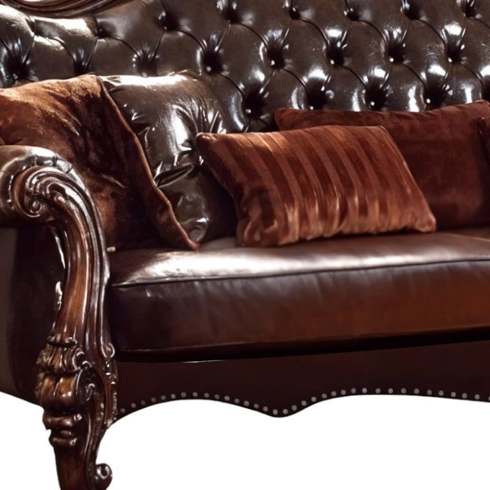 93" Brown Faux Leather Sofa And Toss Pillows With Burgundy Legs