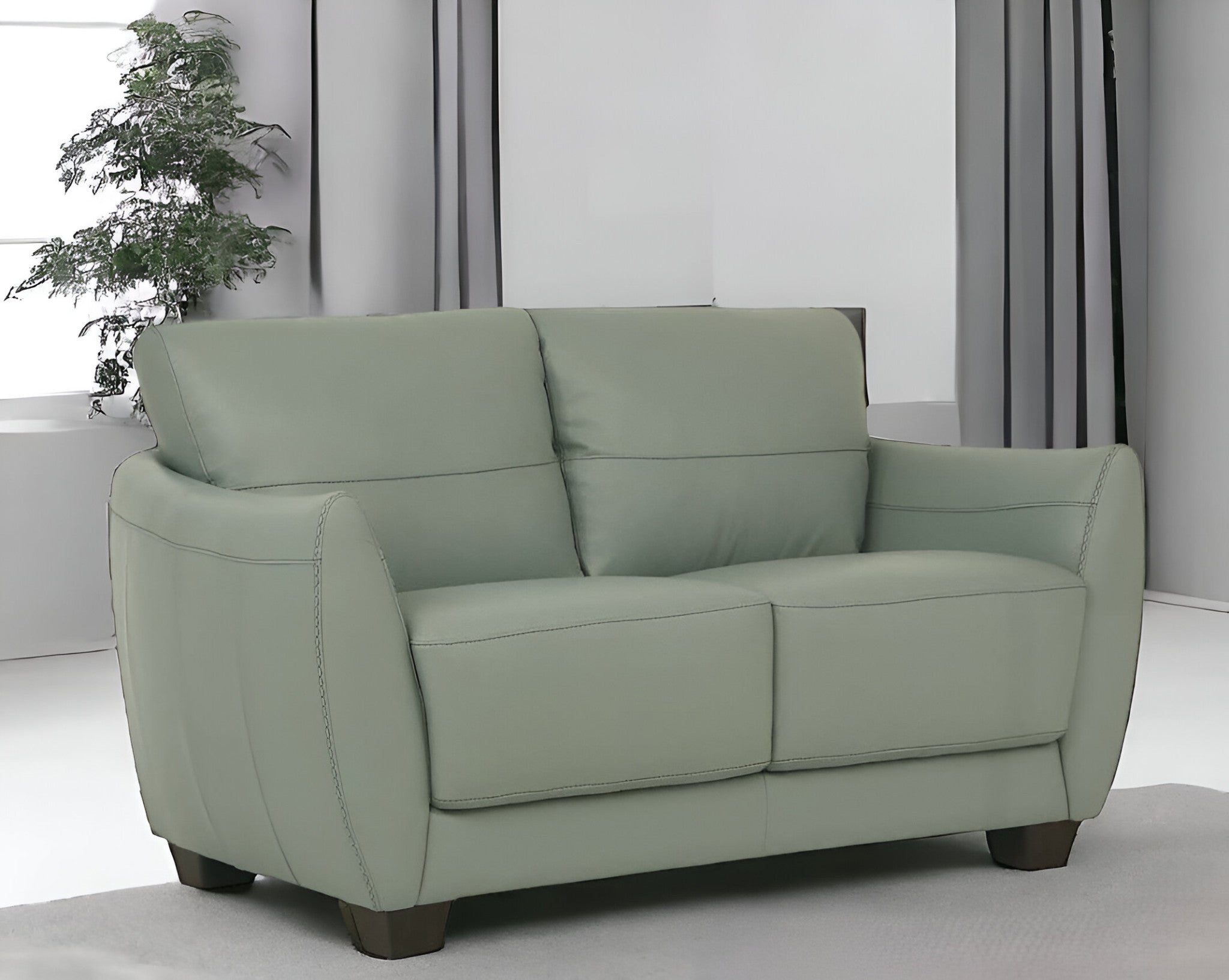 57" Pale Green Leather And Black Love Seat