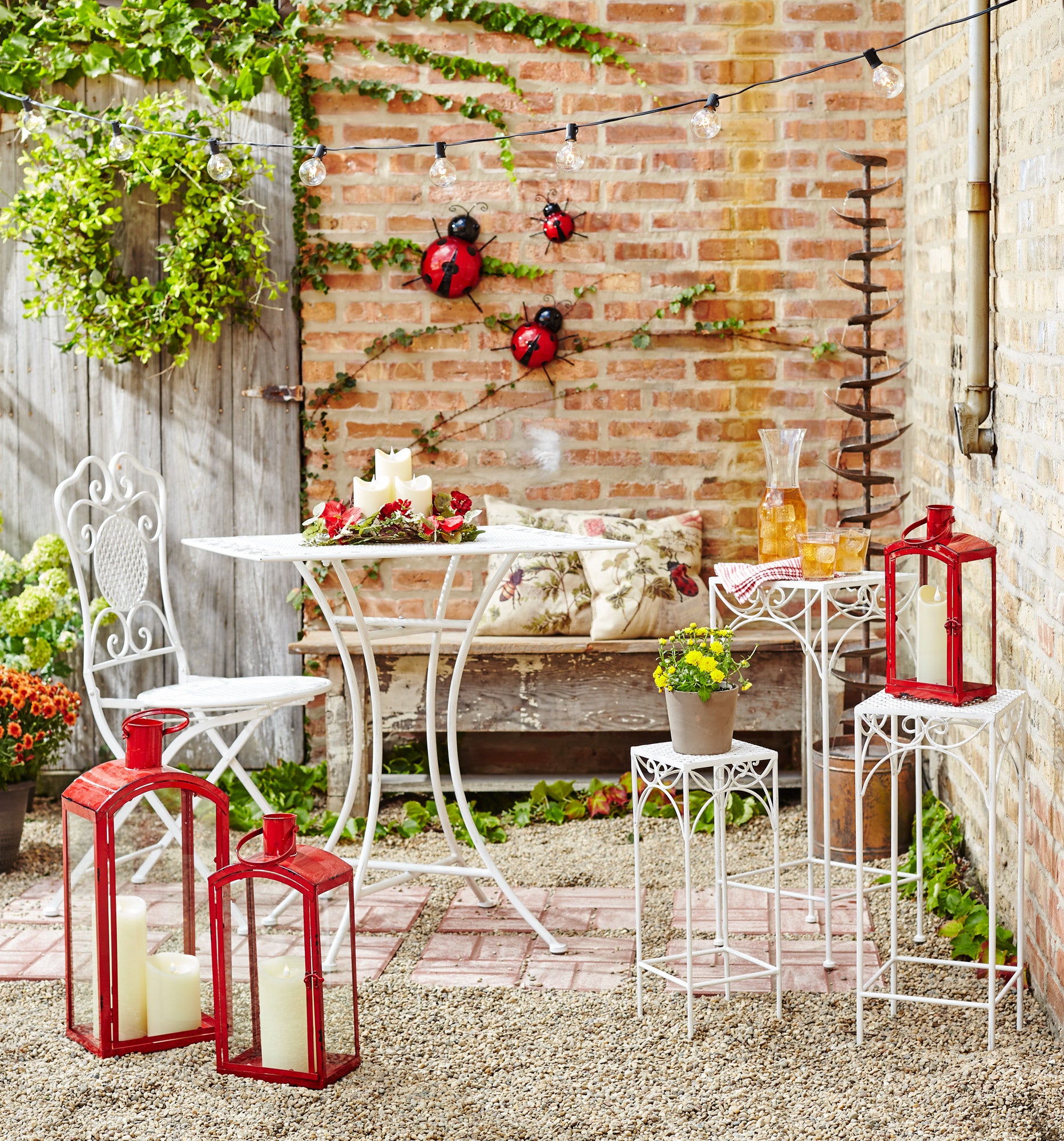 Set of Three Red Metal And Glass Floor Lantern Candle Holders