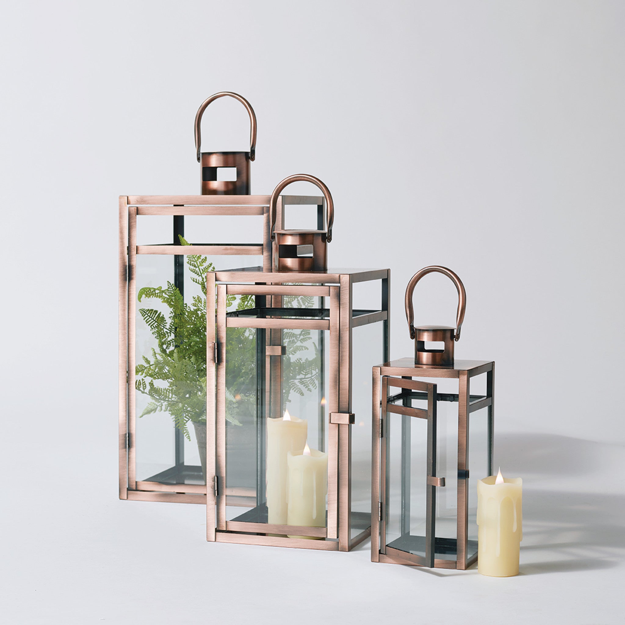 Set of Three Copper Glass and Metal Geometric Floor Lantern Candle Holders