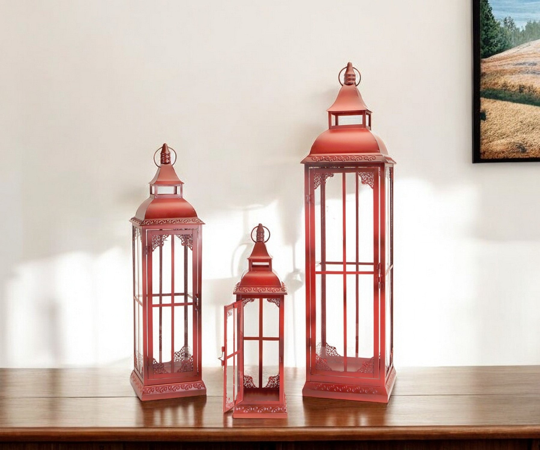 Set of Three Red Glass and Metal Ornate Floor Lantern Candle Holders