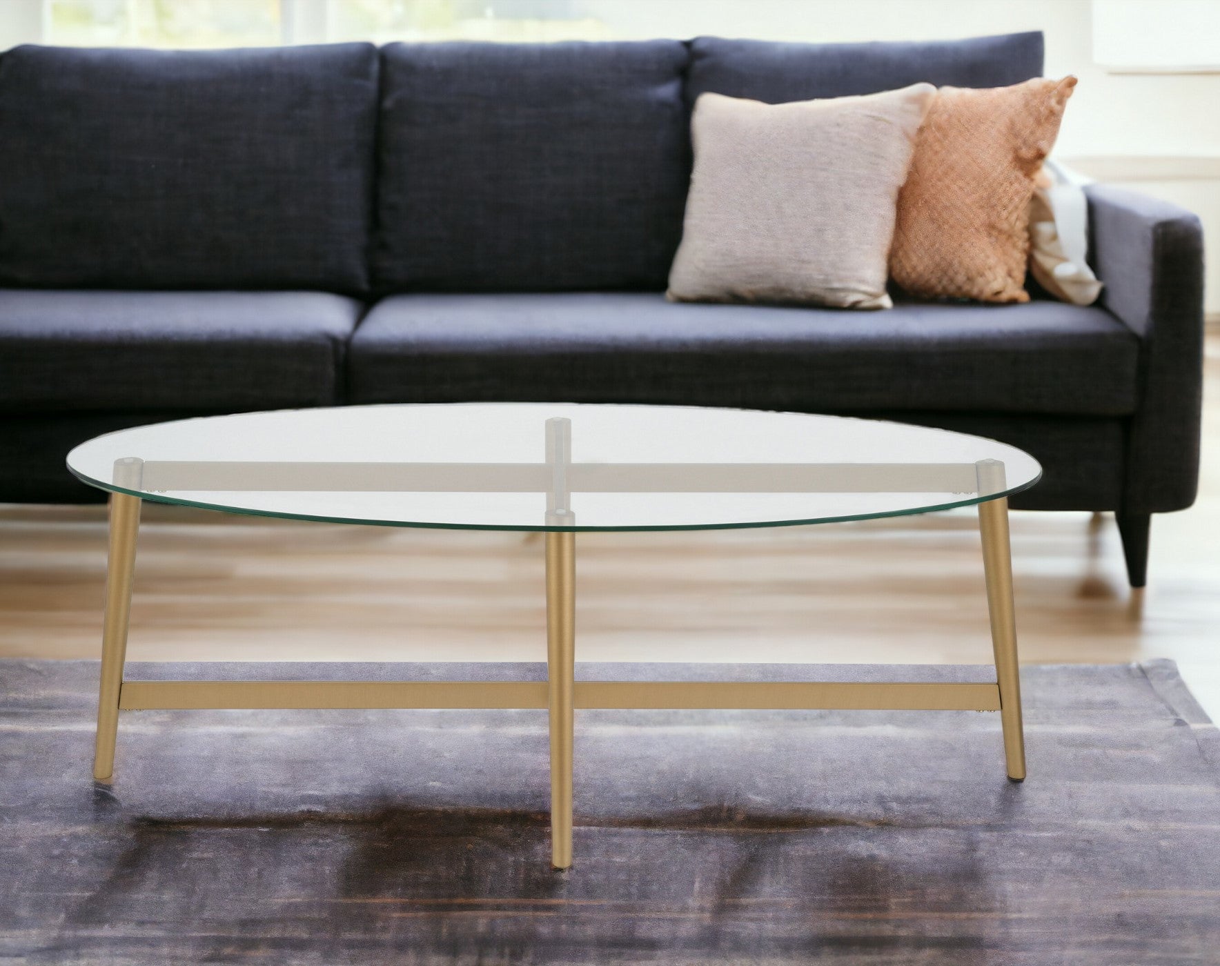 50" Gold Glass And Steel Oval Coffee Table