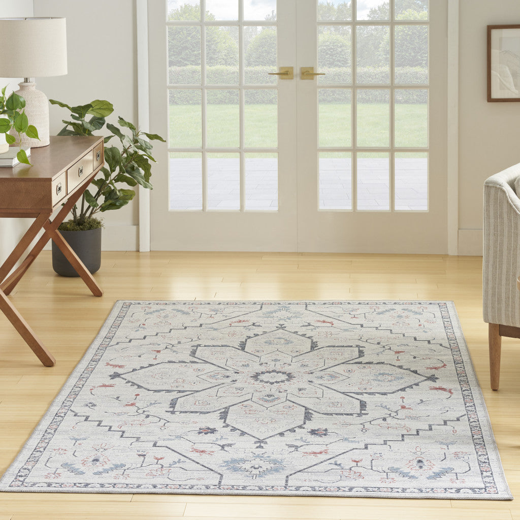 5' x 7' Ivory and Blue Oriental Power Loom Washable Area Rug