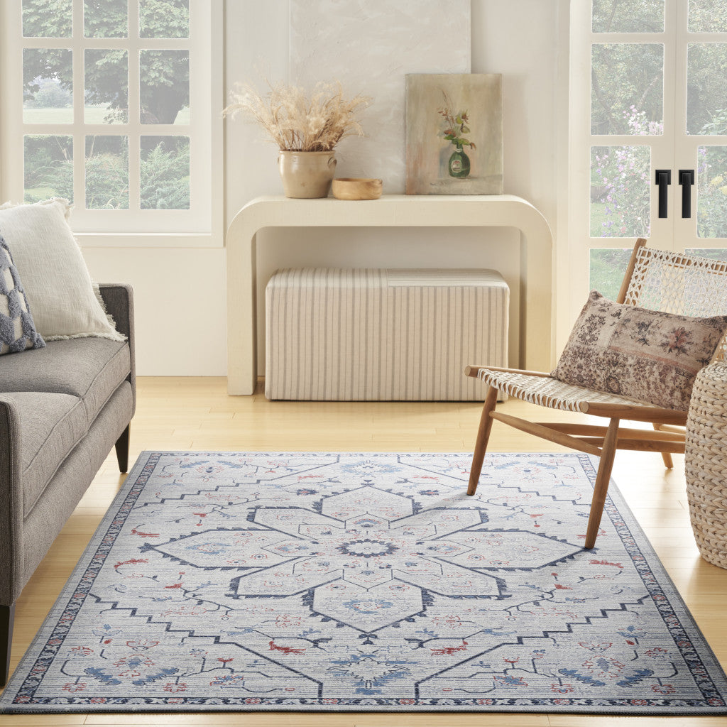 5' x 7' Ivory and Blue Oriental Power Loom Washable Area Rug