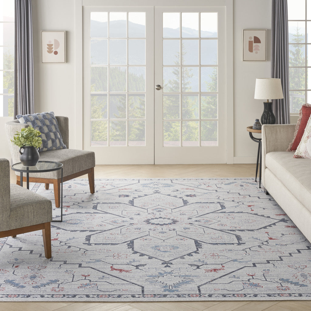 9' x 12' Ivory and Blue Oriental Power Loom Washable Area Rug