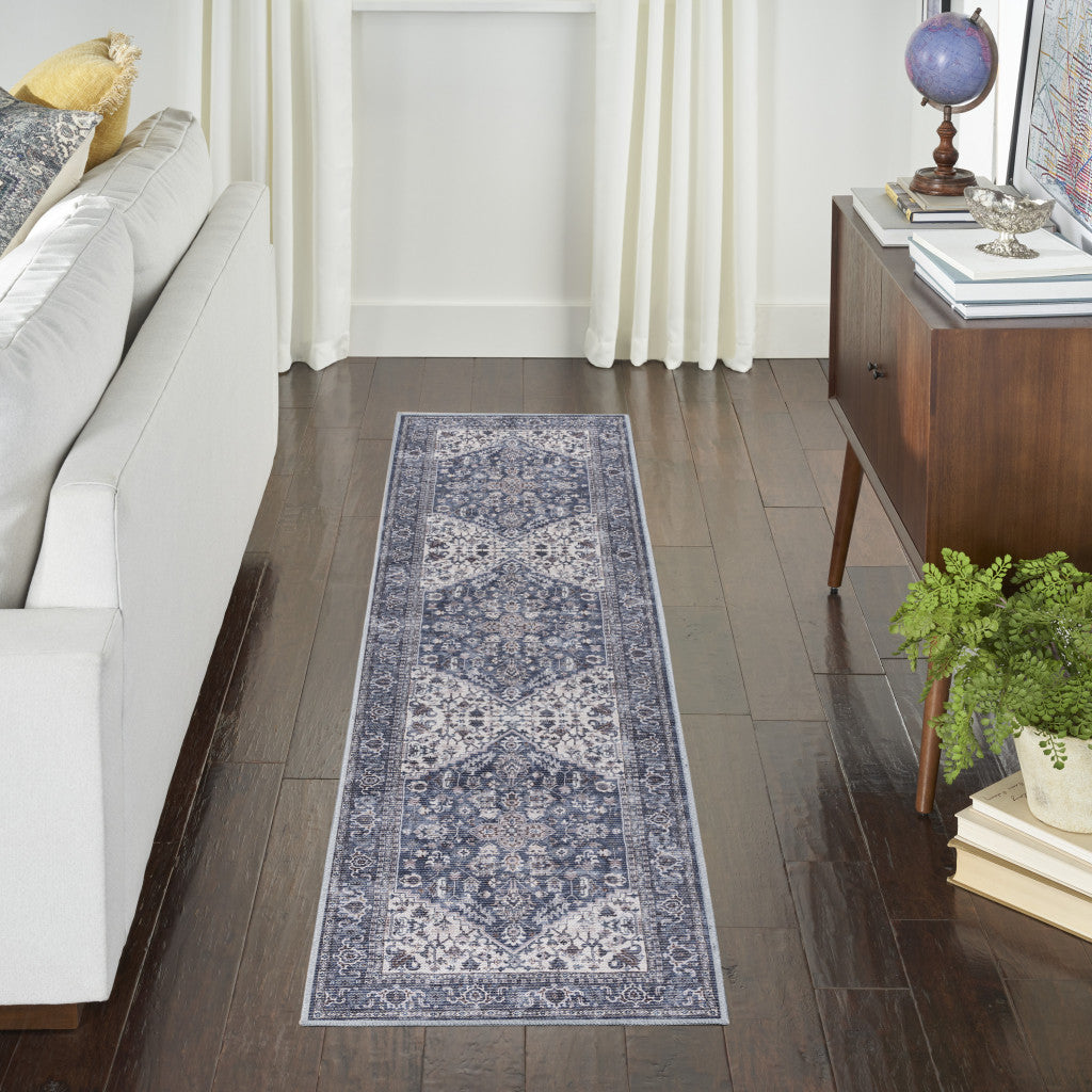 10' Blue and Ivory Floral Power Loom Distressed Washable Runner Rug