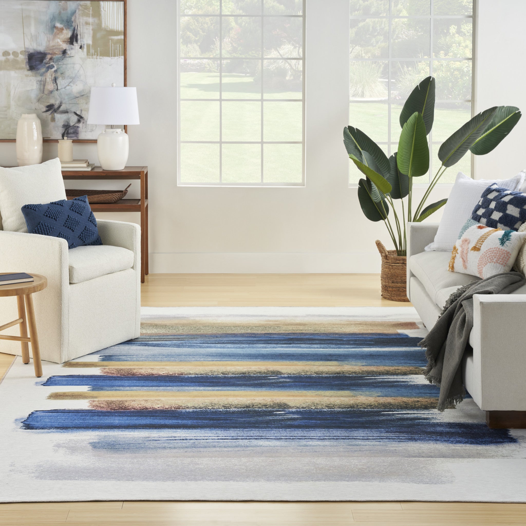 5' x 7' Ivory and Blue Abstract Power Loom Washable Non Skid Area Rug