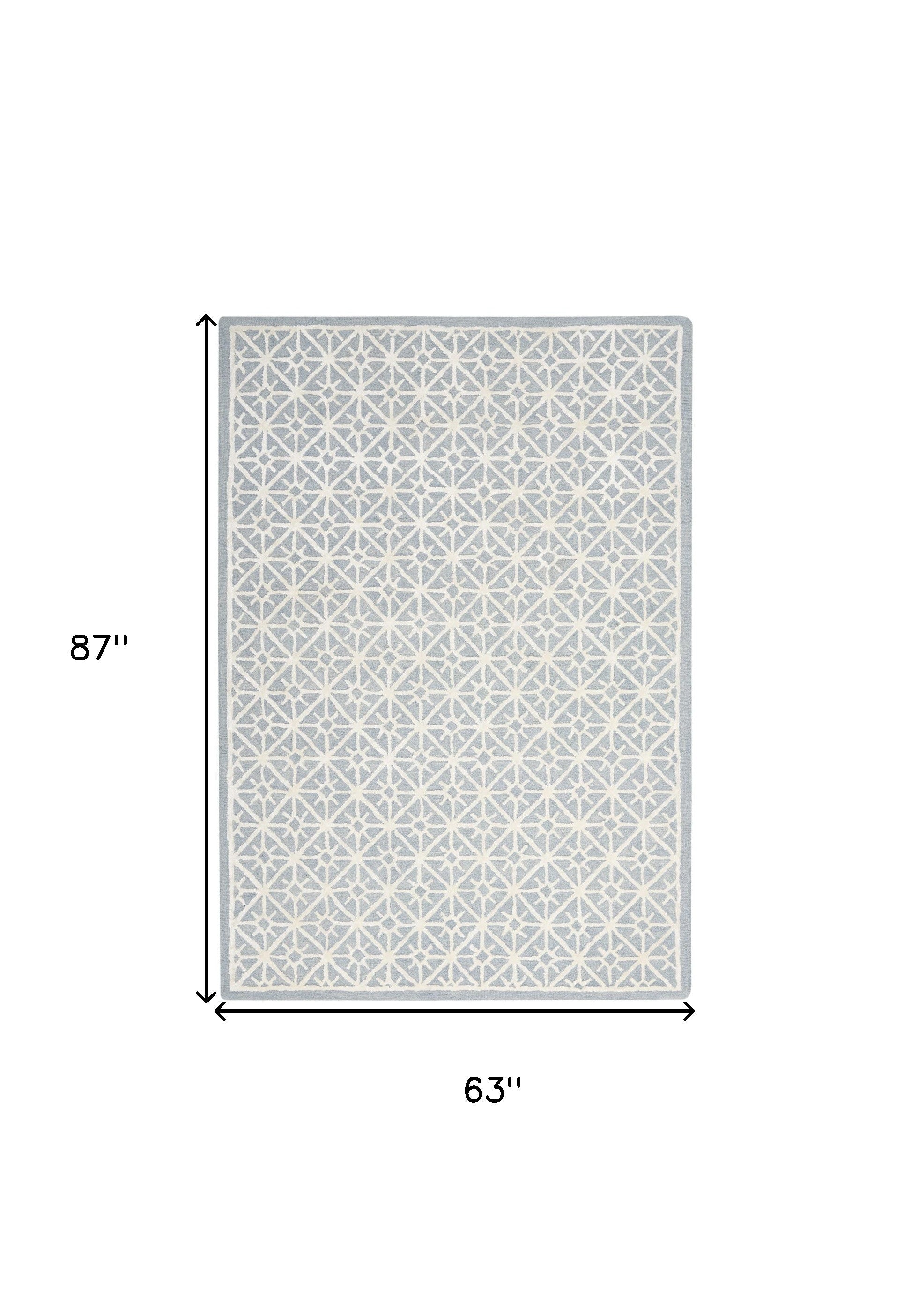 5' x 7' Light Blue and White Geometric Hand Tufted Area Rug