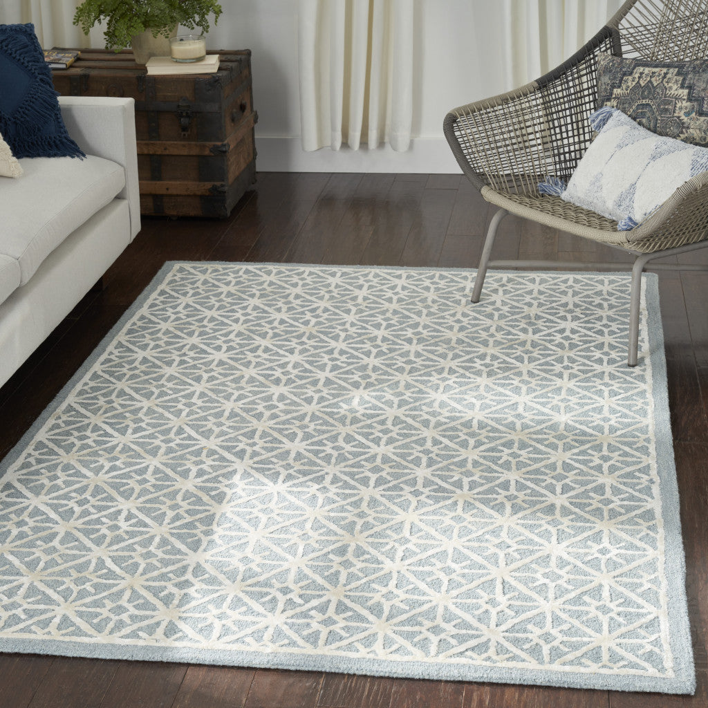 5' x 7' Light Blue and White Geometric Hand Tufted Area Rug