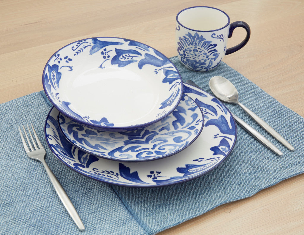 Blue and White Sixteen Piece Round Floral Ceramic Service For Four Dinnerware Set