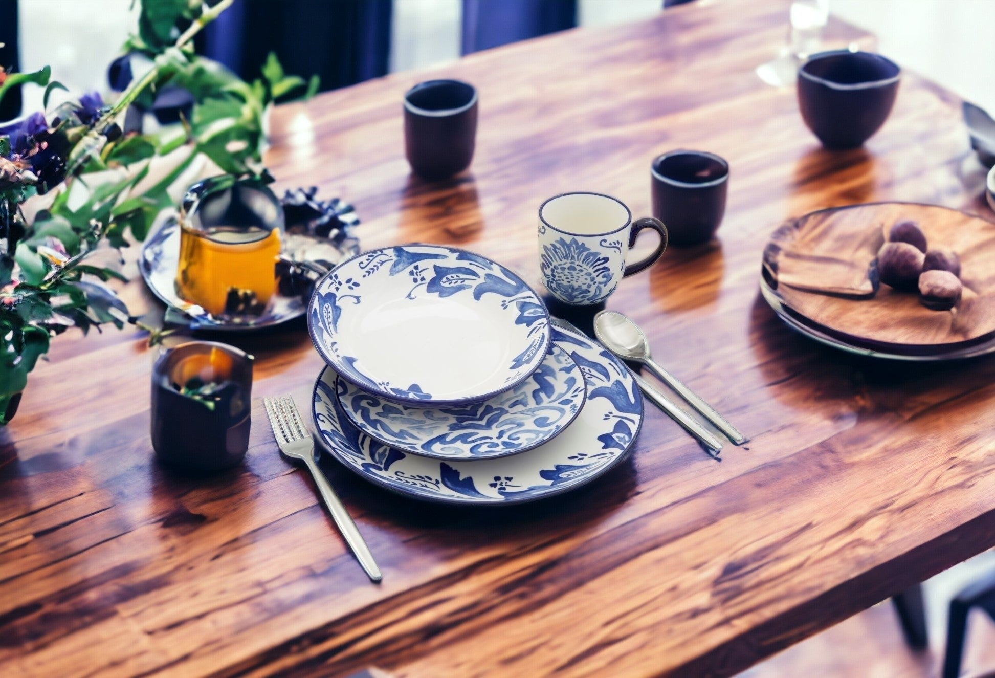 Blue and White Sixteen Piece Round Floral Ceramic Service For Four Dinnerware Set