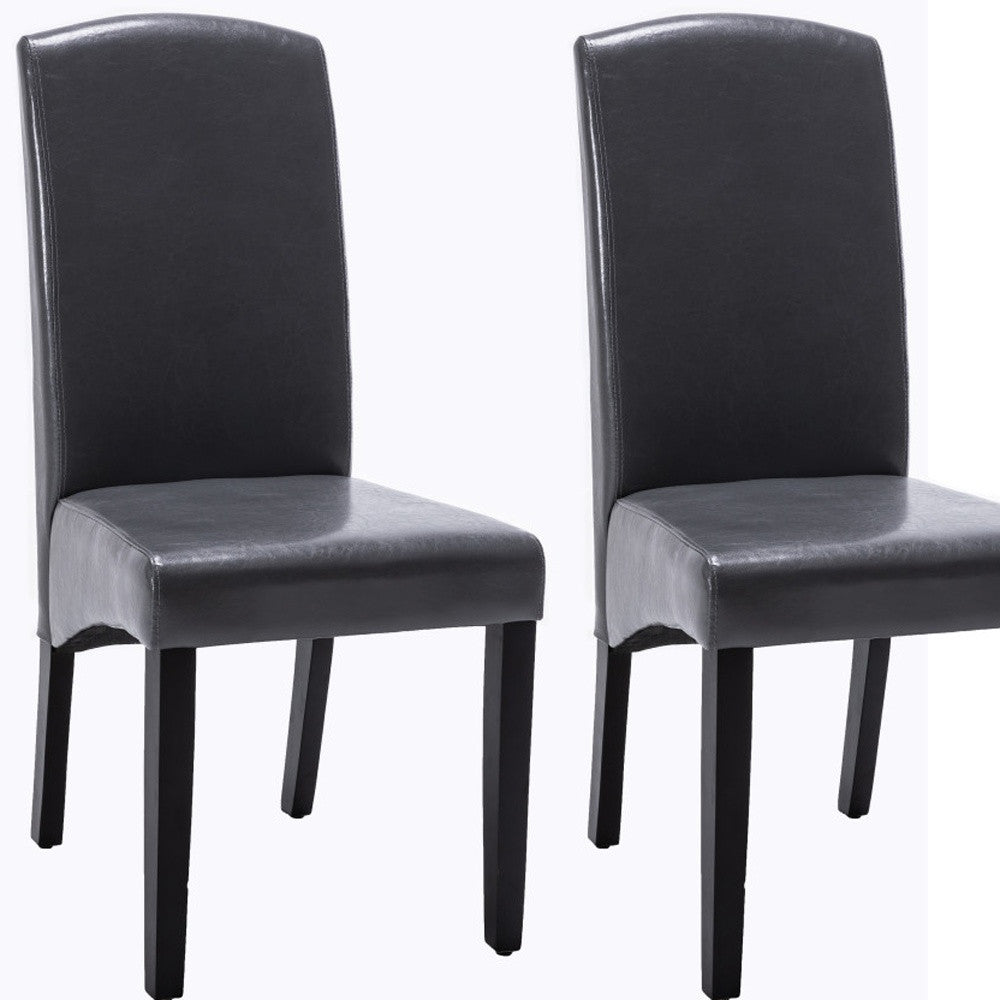 Set of Two Dark Gray And Black Upholstered Faux Leather Dining Parsons Chairs